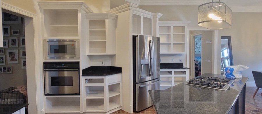 Cabinet painting — built-ins and cabinetry painted bright white, The Paint Guys