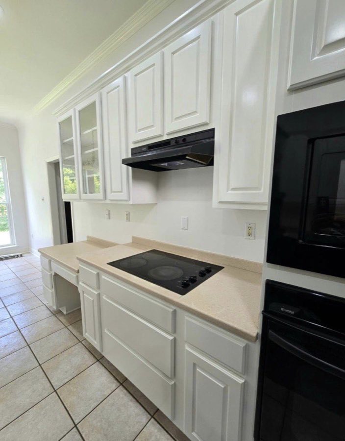 Cabinet painting — white kitchen alternate angle, The Paint Guys