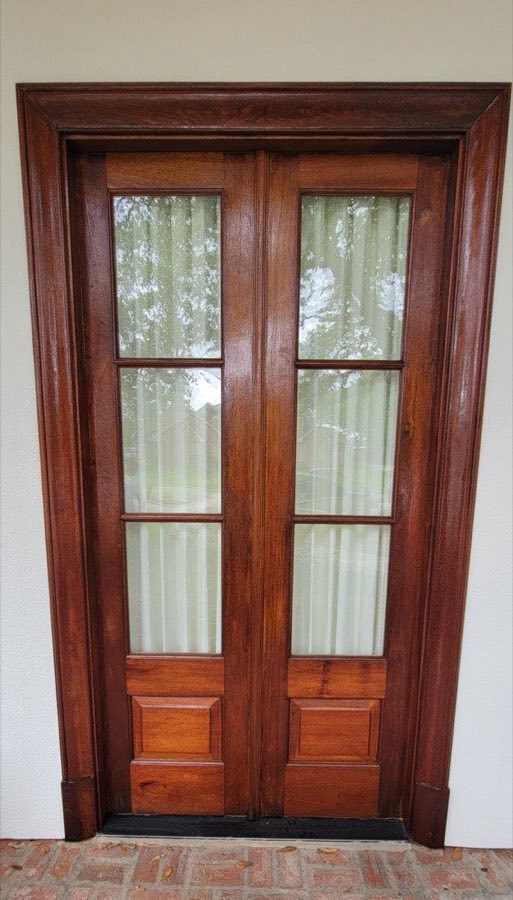 Restoration — mahogany double doors stripped and re-stained, The Paint Guys