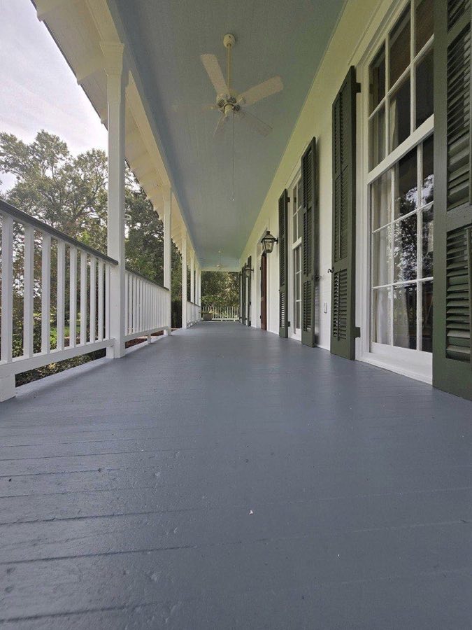 Exterior — long porch with blue ceiling and slate decking, The Paint Guys