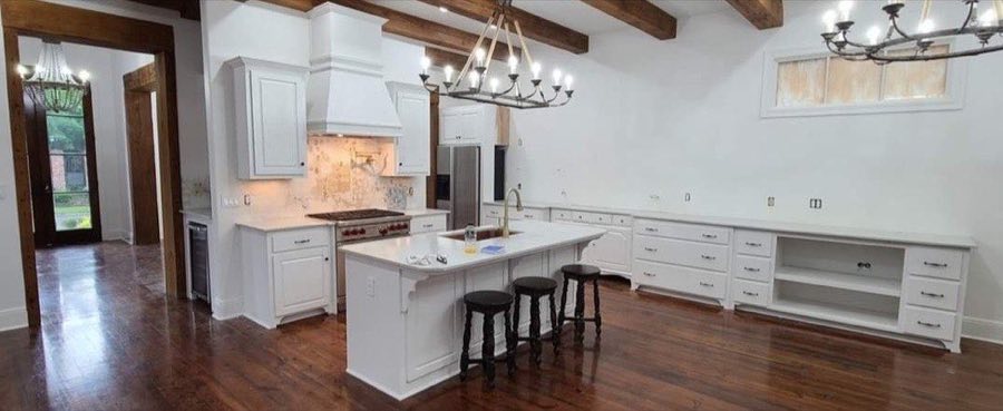 Cabinet painting — open-plan kitchen cabinets refinished in satin, The Paint Guys
